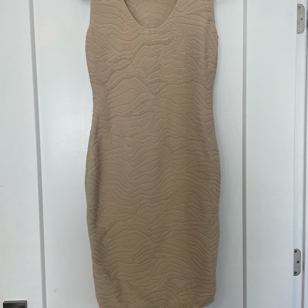Sophisticated Wolford beige dress. Beautiful pattern.